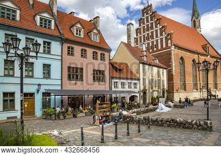 Latvia, Riga, August, 2021 - Panorama Streets Of The Riga Old Town With Open-air Cafes Near The Town