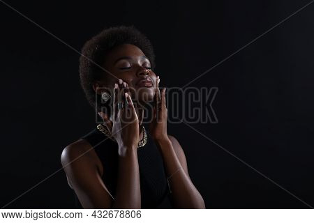 Close Up Portrait Of Young African American Black Woman Doing Facebuilding Yoga Face Gymnastics Yoga