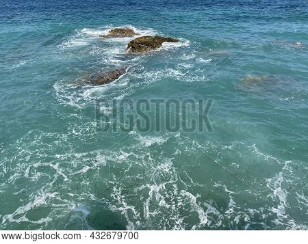 Rocky Beach And Crystal Turquoise Water Of Ionian Sea In Albania.