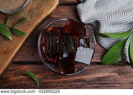 Delicious Grass Jelly Cubes On Wooden Table, Flat Lay