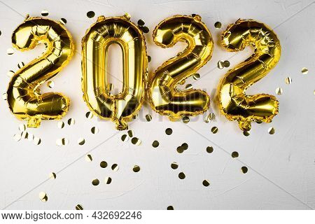 Gold Foil Balloons 2022 New Year. Two Thousand Twenty-second Year Holiday. Celebration Concept. Gray