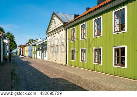 Vastervik, Sweden - 08.23.2021: Street Near The Center With Old, Traditional Colorful Wooden Houses 