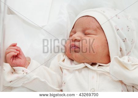 Newborn Girl In The Maternity Hospital