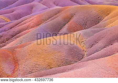 Earth Of Seven Colors, Chamarel, Mauritius. Natural Background From Multi-colored Sand. Selective Fo