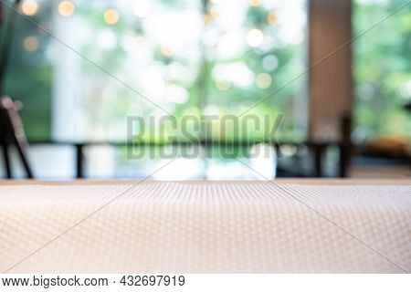 Foam Anti-slip Sheet Base On The Table With Perspective Wood Over Blur Light Bokeh Background For Pa