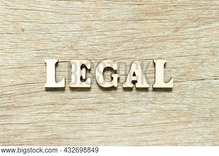 Alphabet Letter In Word Legal On Wood Background