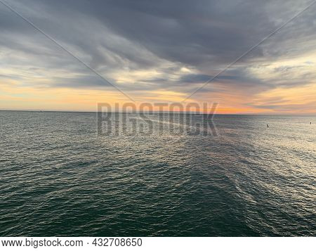Open Sea During Sunset With A Cloudy Forecast In The Atlantic