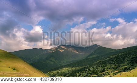 Mountains Of North Ossetia, Beautiful Summer Landscapes With Blue Sky And Clouds.