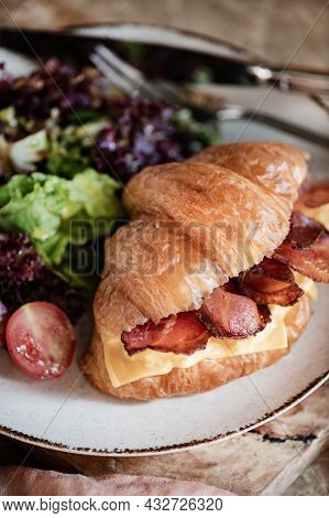 Bacon And Cheddar Cheese Stuffed French Croissant With Side Salad