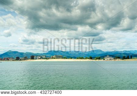 The Town Of Laredo, Seen From The Seafront In Santona, Spain