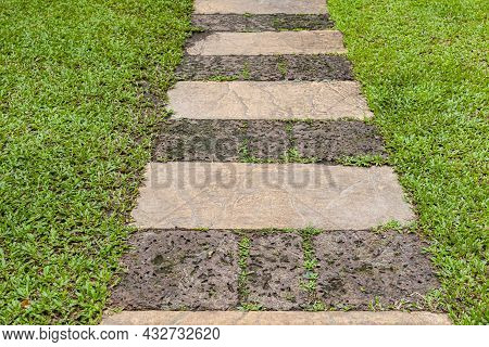 Laterite Stone Walkway Inside The Green Lawn