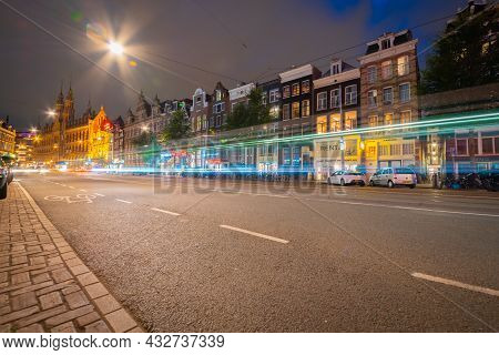 Amsterdam-netherlands - August 21 2017; Night Time In The City, Lights, Street Markings And Red Ligh