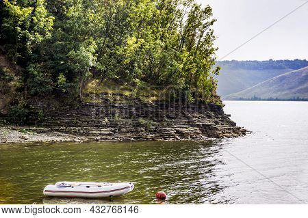 Lonely Boat On The Bay