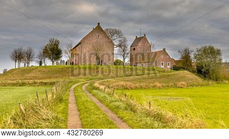 Church On Dwelling Mound Terp In Village Of Ezinge, Groningen Province, The Netherlands. Historic Sc