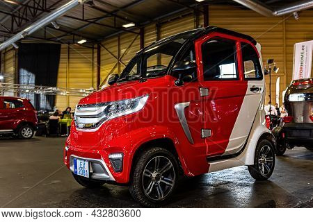 Riga, Latvia, September 25, 2020: Dt Motor Power One Mini Electric Cars At A Motor Show