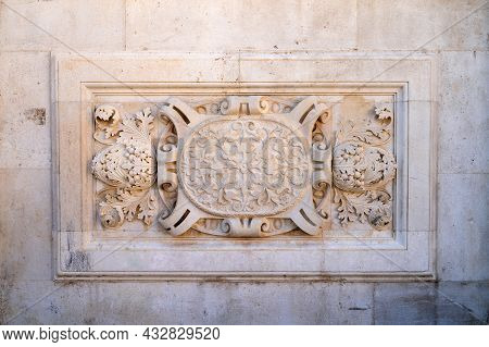 Architectural Detail Of Old Building. Stone Frame. Bas-relief Board