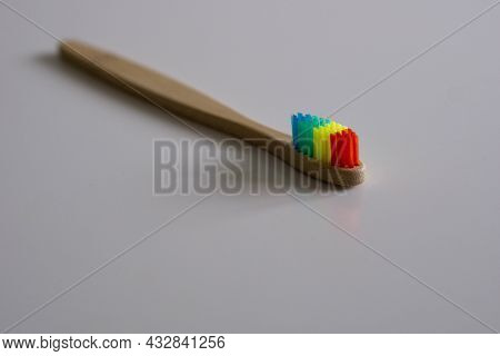 Close Up Of Bamboo Rainbow Dental Toothbrush