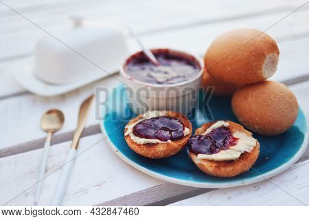 Toasted Buns With Fresh Butter And Plum Jam
