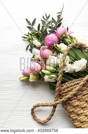Bouquet Of Pink Colored Roses In Whicker Shopping Bag. Top View, Flat Lay.