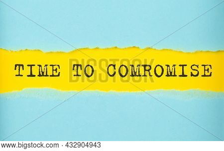 Time To Compromise Text On Torn Paper , Yellow Background