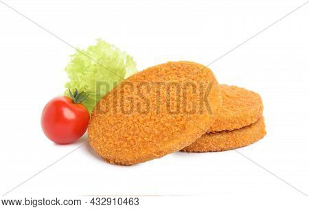 Uncooked Breaded Cutlets, Tomato And Lettuce On White Background. Freshly Frozen Semi-finished Produ
