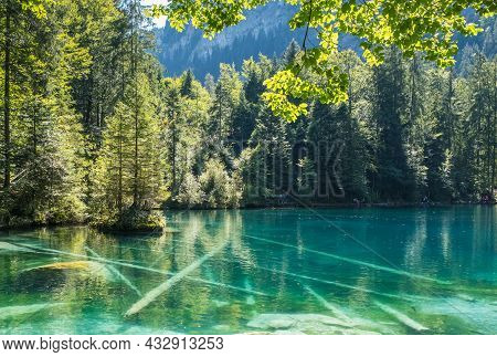 Blausee (blue Lake), Bernese Oberland, Switzerland. Nature Landscape With Crystal Clear Lake Water.