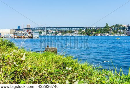 View Of Buildings Along Lake Union. Shot Taken From Gasworks Park In Seattle, Washington.