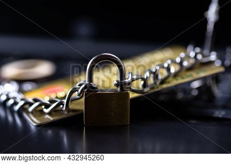 Credit Card Security, Safe Trading. Credit Card Closed With A Padlock And Chain