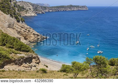 Turquoise Waters In Mallorca. Coll Baix Beach. Mediterranean Coastline. Spain