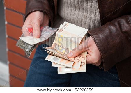 Drug Dealer Counting Money
