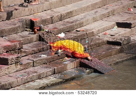 Kathmandu, Nepal - September 21: Dead Body Preparing For Cremation Ceremony Along The Holy Bagmati R