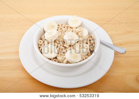 Round Oat Cereal With Sliced Banana