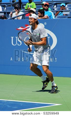 Professional tennis player David Ferrer from Spain practices for US Open 2013