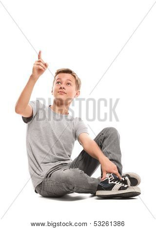 Teenage Boy Points Up