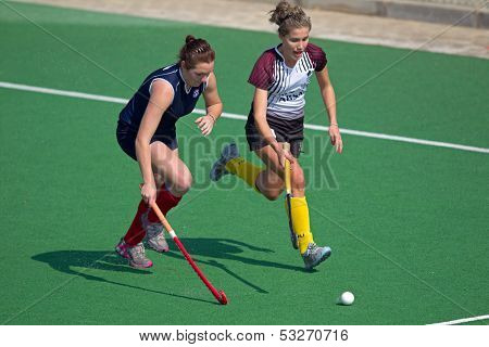 BLOEMFONTEIN, SOUTH AFRICA - AUGUST 7: Unidentified players during a women's field hockey match between the North West University and the University of the Free State, on Aug. 7, 2010 in Bloemfontein, South Africa.