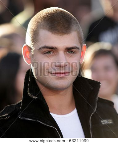 LOS ANGELES - MAR 18:  Garrett Clayton arrives to the 'Divergent' Los Angeles Premiere  on March 18, 2014 in Westwood, CA                