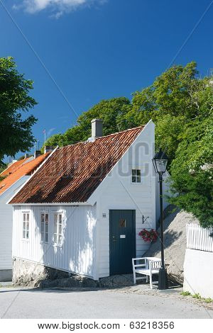 Traditional white wooden house in Norway