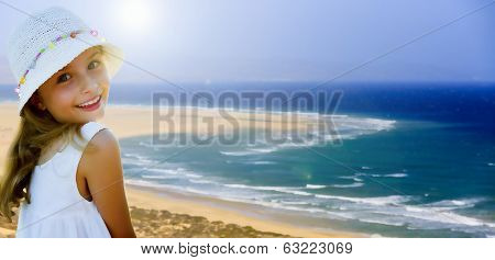 Summer on the beach - lovely girl enjoying summer vacations