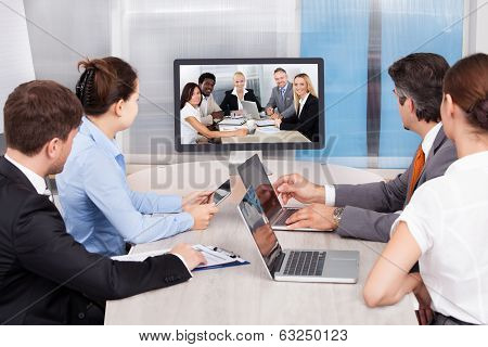 Businesspeople Looking At Computer Screen
