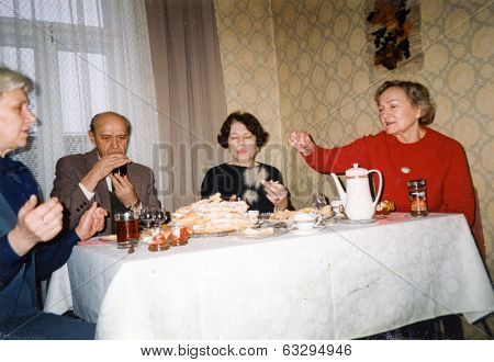 LODZ, POLAND CIRCA 1970's: Vintage photo of people enjoying a family party