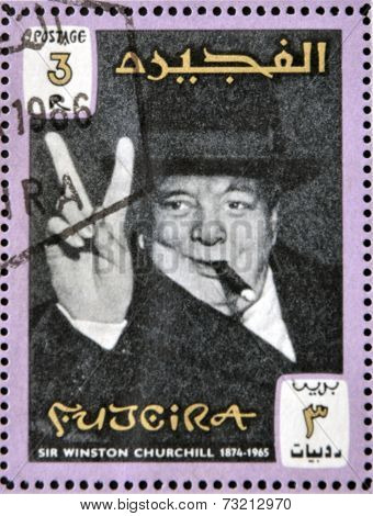 FUJERIA - CIRCA 1966: A stamp printed in Fujeira shows image of sir winston churchil 1874-1965