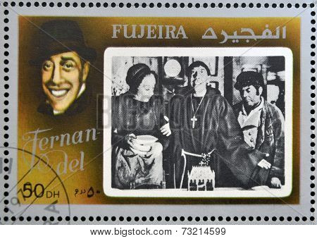 FUJEIRA - CIRCA 1972 : stamp printed in Fujeira shows french actor Fernandel circa 1972