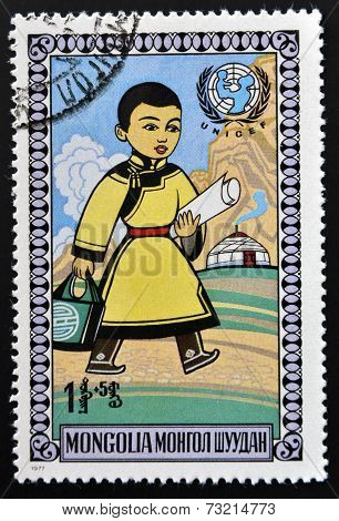 MONGOLIA - CIRCA 1977: A stamp printed in Mongolia shows Walking boy circa 1977