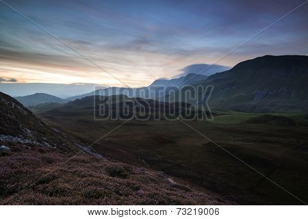 Stunning Sunrise Mountain Landscape With Vibrant Colors And Beautiful Cloud Formations