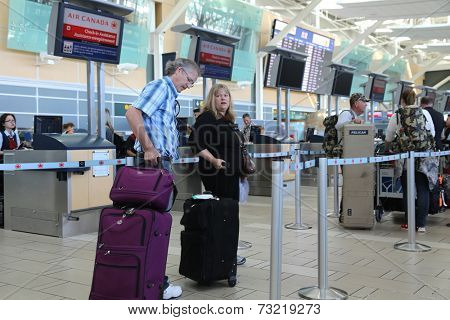 Vancouver, BC Canada - September 13, 2014 : Close up Air Canada registration desk at YVR airport in Vancouver BC Canada. 