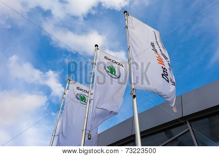 Samara, Russia - October 4, 2014: The Flags Of Skoda Over Blue Sky. Skoda Auto More Commonly Known A