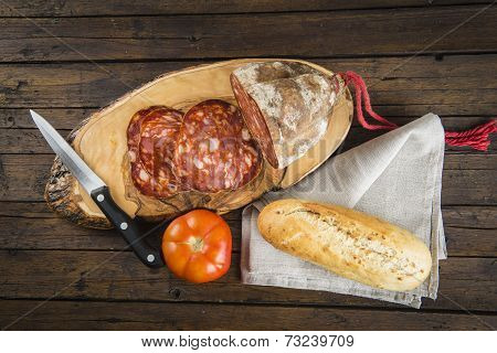 Morcon, A Spanish Sausage With Bread And Tomato