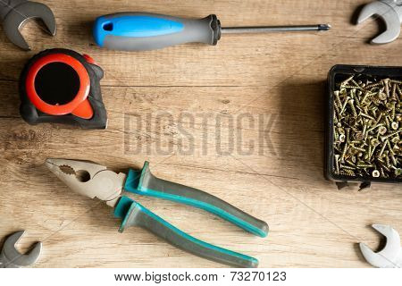construction tools on wooden desk 