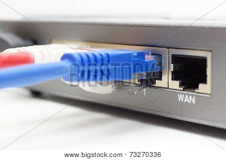 Closeup Of Router With Cables And Wan Port