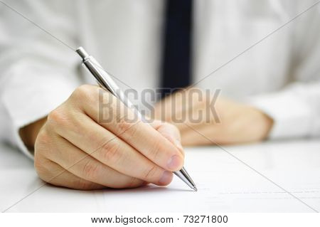 Businessman Is Signing Agreement